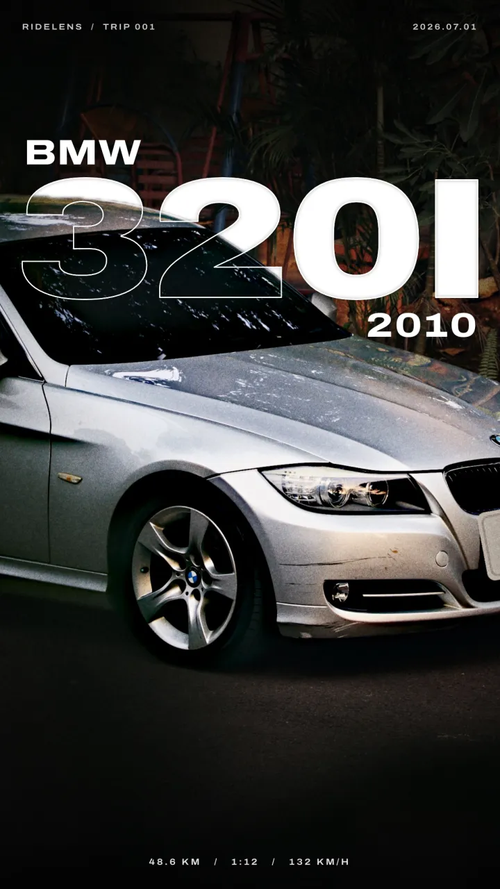‘Outline’ poster: BMW 320I in outlined type behind the silver BMW, shot through the leaves